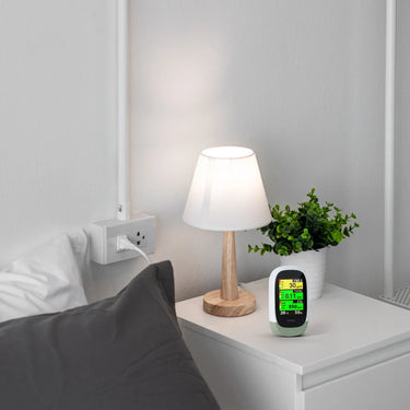 Ionmax Q10 Air Quality Monitor on bedside table
